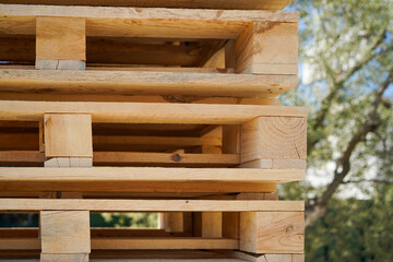 Stacked Wooden Pallets in an Outdoor Environment Highlighting Natural Textures