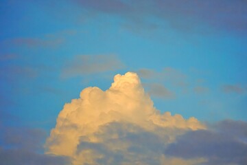 White clouds in a blue sky.