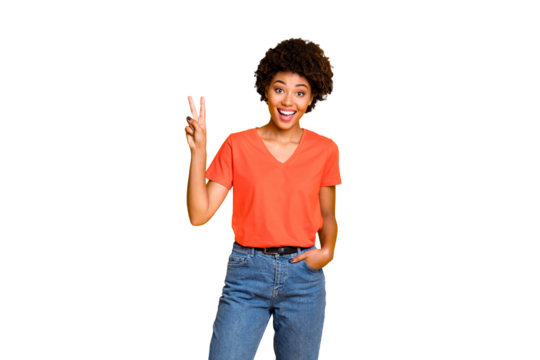 Photo of charming cute nice attractive girlfriend standing friendly confidently showing you v-sign while hand in pocket isolated over yellow vivid color background wearing t-shirt denim