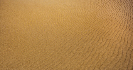 top view on empty surface of sand on a beach with textured effects background