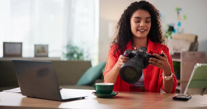 Camera, laptop and photography with woman in office for research or small business startup as entrepreneur. Agency, computer and creative with happy photographer at work for development or planning