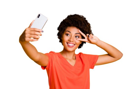 Photo of attractive cute nice charming sweet pretty casual curly wavy stylish trendy girlfriend taking selfie showing you v-sign wearing t-shirt isolated over yellow vivid color background