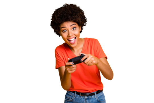 Photo of cheerful charming cute sweet attractive player enjoying game process holding joystick with her hands wearing orange t-shirt jeans denim isolated bright color background
