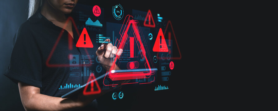 Woman using touchscreen interface with red warning signs in futu