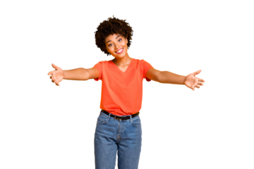 Photo of cheerful charming trendy cute black lady inviting you to hug with her wearing jeans denim orange t-shirt kind and lovely isolated over yellow vivid color background