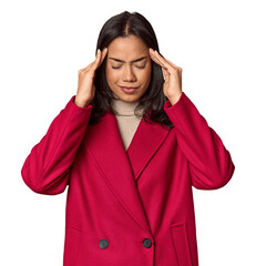 Young filipino woman touching temples and having headache.