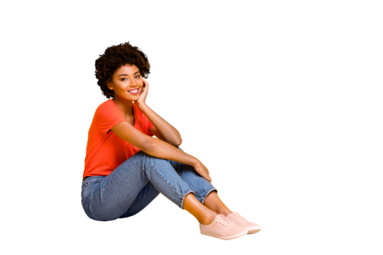 Full length photo of positive cheerful woman have fun free time sit wear casual style clothes sneakers isolated over yellow color background