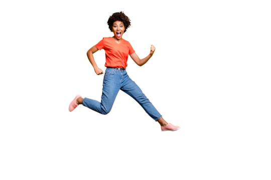 Full length photo of crazy funky funny girl scream have fun jump wear casual trendy lifestyle outfit sneakers isolated over yellow bright color background - Powered by Adobe