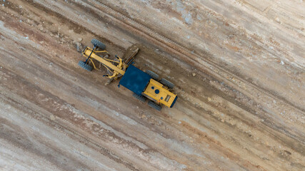 Aerial view motor grader civil at construction site, Motor grader work on construction site, Road...
