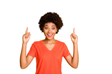 Photo of charming cheerful attractive girlfriend afro american pointing up to show you something while wearing t-shirt isolated over yellow vibrant color background