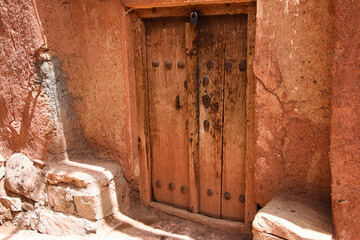 old door, old wooden door, ancient wooden door, Old Wooden Door in the Historic Village of Abyaneh, Traditional Iranian Wooden Doors, rustic village architecture, clay house, Iran, Persian, Persia