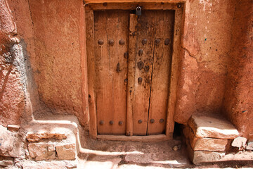 old wood door, ancient wooden door, Old Wooden Door in the Historic Village of Abyaneh, Traditional Iranian Wooden Doors, old wooden door, rustic village architecture, Iran, Persian, Persia