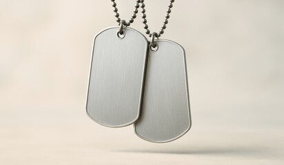 Fototapeta premium Two Blank Silver Tags on a Ball Chain, a Symbol of Military Service and Personal Identification with Copy Space
