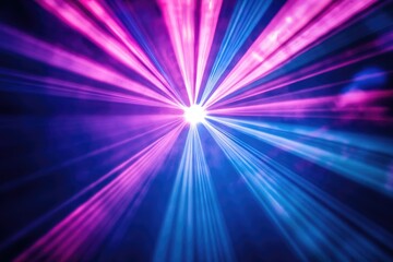 Vibrant pink and blue laser beams converge in a dazzling display of light and color.