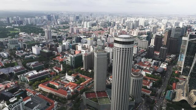 Spin around AXA Tower in Singapore, gloomy day