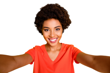 Photo of charming cute cheerful sweet nice girlfriend taking selfie recording video influencing her audiences while isolated over yellow bright color background