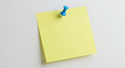 A yellow sticky note is secured with a blue push pin against a clean white background.