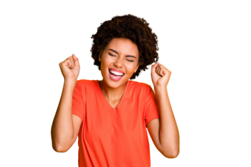 Photo of cheerful excited ecstatic black girlfriend rejoicing with victory of something making fists wearing t-shirt isolated with yellow vibrant color background