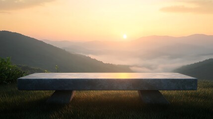 Minimalist granite stone table on grass facing a glowing sunrise over misty mountains suitable for nature inspired presentations