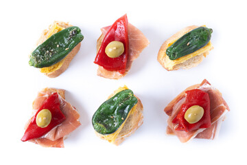 Traditional Spanish pintxos isolated on white background