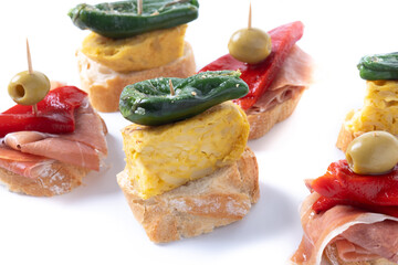 Traditional Spanish pintxos isolted on white background
