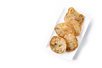 Tortillitas de camarones isolated on white background. Top view. Copy space