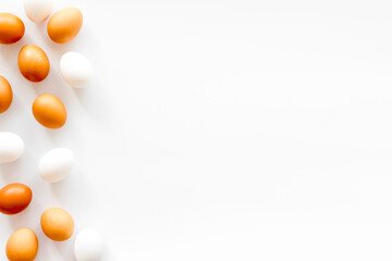 Set of chicken eggs on white background, top view. Food pattern. Easter background