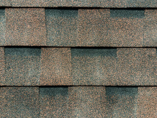Asphalt roofing shingles texture background. House roof shingles