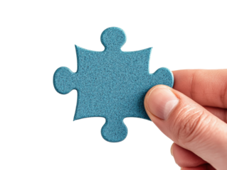 Holding a blue puzzle piece for creative games and teamwork activities, cut out