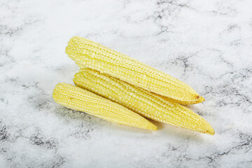 Raw sweet baby corn heap