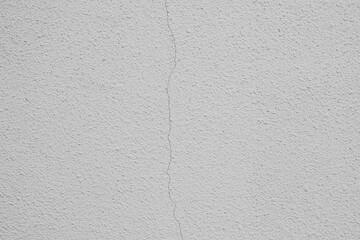 Wall with visible crack displaying texture in well-lit environment