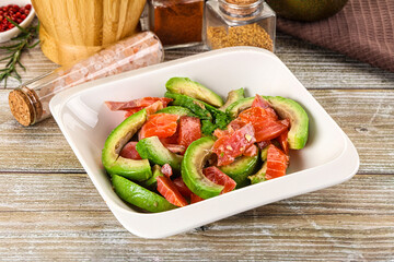 Salad with avocado and salmon
