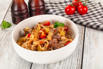 Asian udon noodles with beef