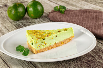Green pistachio cheesecake served mint
