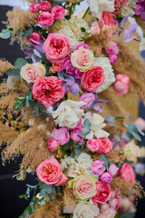 landscape with a floral arrangement of various roses