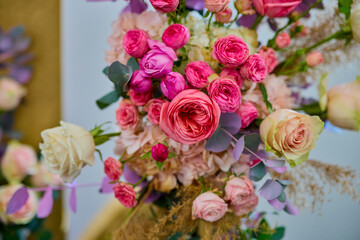 landscape with a floral arrangement of various roses