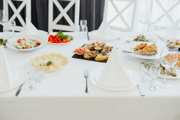 Elegant dining setup with diverse dishes for a special gathering