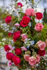 landscape with a floral arrangement of various roses