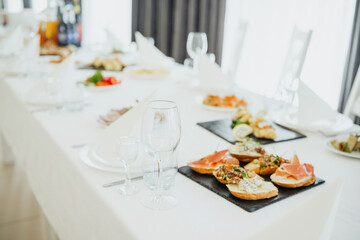 Appetizing spread of gourmet dishes at a fine dining event in bright setting