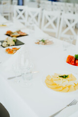 Delicious dining table spread with fresh pasta and assorted dishes in restaurant