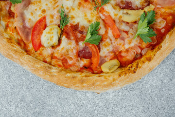 Delicious vegetarian pizza topped with colorful vegetables and herbs