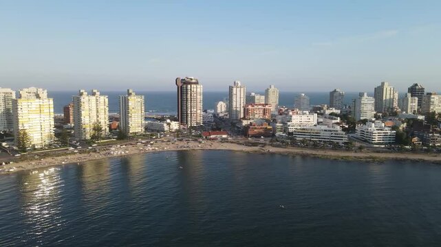 Aerial view of punta del este coastline, uruguay, featuring playa mansa beach, modern buildings, and the atlantic ocean
