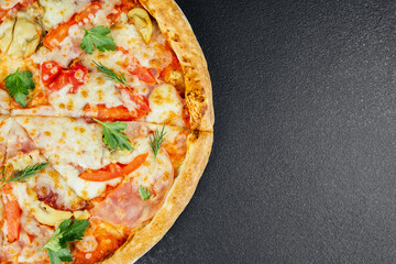Delicious pizza with fresh toppings displayed on a dark surface