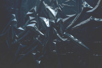 Transparent plastic wrap texture overlay effect. Transparent stretched film polyethylene. Plastic foil texture. Cellophane package mockup