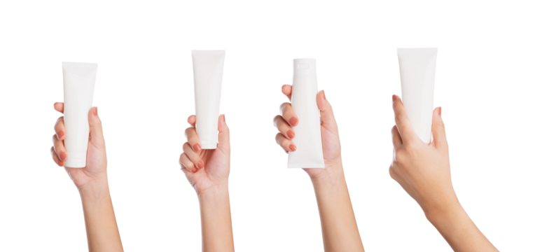 Female hand holding blank cosmetic bottle isolated on white background - Powered by Adobe