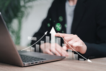 Profit and cost management concept, Businesswomen show the percentage of profit growth and cost reduction, Budget management and Effective business cutting the budget of the company, Money planning