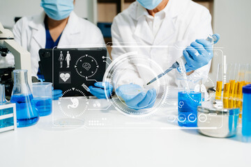 Fototapeta premium Modern medical research laboratory. female scientist hands working with micro pipettes analyzing biochemical samples