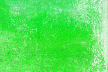Green textured background with white splashes creating a mottled effect