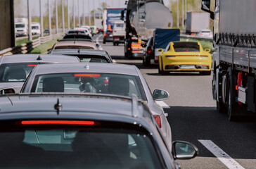 Traffic jam on highway cars and trucks 