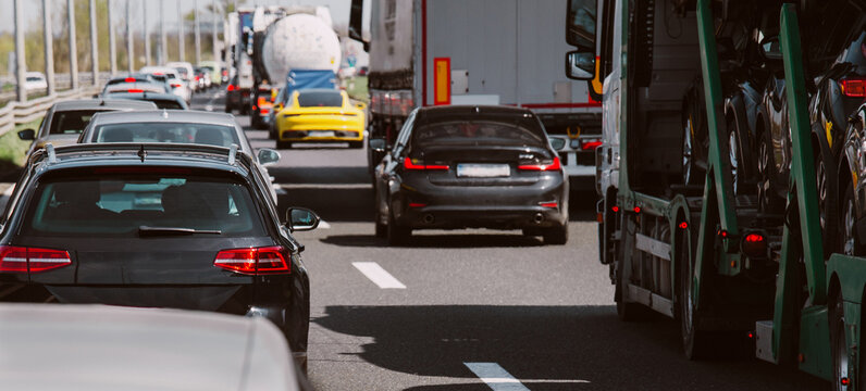 Traffic jam on highway cars and trucks 